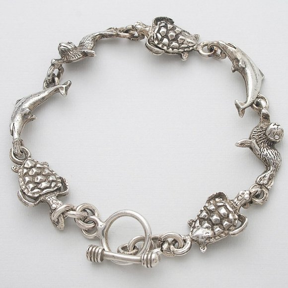 Vintage Real Sterling Silver Dolphin, Turtle, Otter Charm Bracelet Stamped 925 - Picture 1 of 7